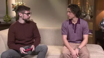 Todd Snyder Plum Knit Polo Shirt worn by Tom Holland in Playing Uncharted With Tom Holland YouTube video by jacksepticeye