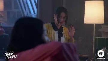 J.Crew Tipped Cotton Blend V-Neck Cardigan in yellow worn by Mariana Adams Foster (Cierra Ramirez) as seen in Good Trouble Tv series wardrobe (Season 4)