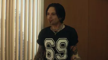 69 Word Black Tee worn by Tommy Lee (Sebastian Stan) in Pam & Tommy TV series outfits (Season 1 Episode 8)