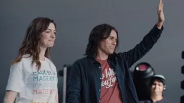 Made By We T-Shirt worn by Rebekah Neumann (Anne Hathaway) in WeCrashed TV show outfits (Season 1 Episode 3)