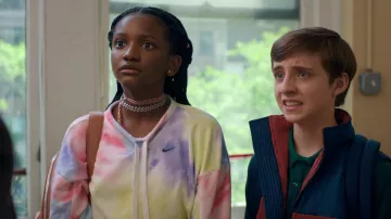 Nike Tie and Dye sweater worn by Libby (Aria Brooks) as seen in Better Nate Than Ever movie outfits