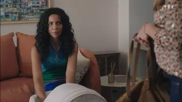 The blue, green and purple dress sparkling Maje worn by Marta Guéraud (Sarah Fitri) in the series Here it all begins