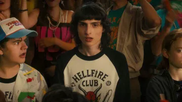 Hellfire Club Raglan T-shirt worn by Mike Wheeler (Finn Wolfhard) in Stranger Things TV show (Season 4 Episode 1)