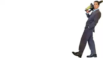 Christian Bale is using Poulan Chainsaw as Patrick Bateman in American Psycho movie poster