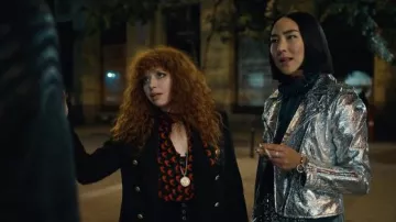 Diane von Furstenberg Black and red tie neck blouse worn by Nadia Vulvokov (Natasha Lyonne) in Russian Doll TV show (Season 2 Episode 4)