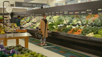 Reebok Classic Leather Legacy Snowy Grey Solar Gold sneakers worn by Noa (Daisy Edgar-Jones) in the movie Fresh