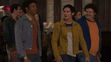 Mustard Yellow denim jacket worn by Jonah Heidelbaum (Logan Lerman) as seen in Hunters TV series outfits (Season 1 Episode 1)