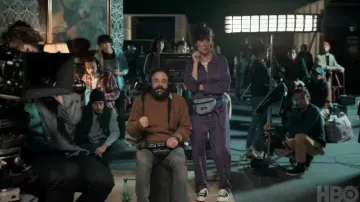 Eastpak belt bag worn by Carla (Nora Hamzawi) as seen in Irma Vep TV series wardrobe (Season 1)