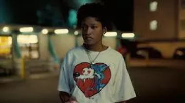 Camiseta de Wolf In Love usada por Jill Haywood (Keke Palmer) en la película Nope