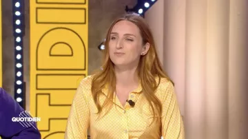 The yellow Akho shirt worn by Alison Wheeler on the show Quotidien
