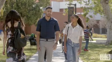 Scotch & Soda polo relaxed fit in navy blue worn by Jordan Baker (Michael Evans Behling) in All American TV show (Season 4 Episode 18)