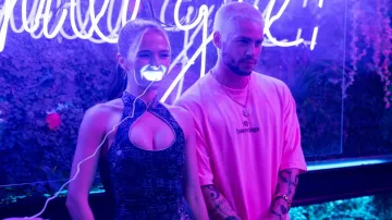 Balenciaga Sponsor Logo T-shirt in pink worn by Colin (Dylan O'Brien) as seen in Not Okay movie