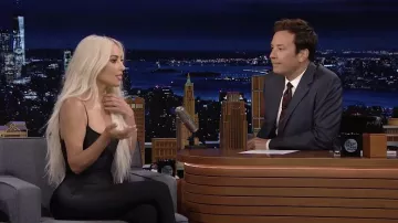 Skims Black long slip dress worn by Kim Kardashian as seen in The Tonight Show Starring Jimmy Fallon on June 21, 2022