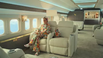 La DoubleJ Party Bag in floral print worn by Molly Novak (Maya Rudolph) as seen in Loot (S01E01)