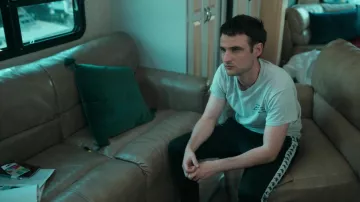 Kappa track pants worn by Eamonn (Tom Sturridge) as seen in Irma Vep TV show wardrobe (S01E03)