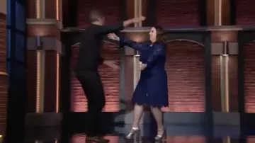 Gucci Belted Floral Lace Mini Dress in blue worn by Beanie Feldstein as seen in Late Night with Seth Meyers