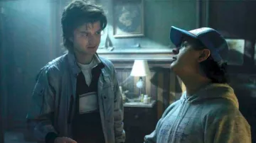 Blue Polo with White Stripe worn by Steve Harrington (Joe Keery) in Stranger Things Wardrobe (Season 4 Episode 4)