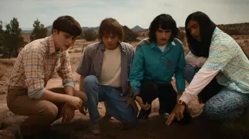 Saucony Sneakers in grey worn by Will Byers (Noah Schnapp) as seen in  Stranger Things Tv series outfits (Season 4 Episode 1)