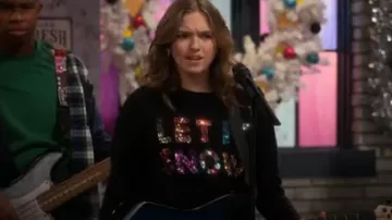 Suéter navideño de Asos Charity usado por Presley (Jayden Bartels) como se ve en Side Hustle (S02E08)