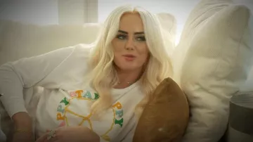 Revolutions Graph­ic Sweat­shirt worn by Kathryn Dennis as seen in Southern Charm (S08E01)