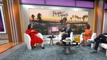 Valentino Pussy Bow Pleated Silk Dress worn by Sofia Carson as seen in CBS Evening News on 25 July 2022