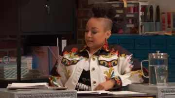 Versace Jeans Couture Sun Flower Garland Denim Jacket worn by Raven Baxter (Raven-Symoné) as seen in Raven's Home (S05E15)