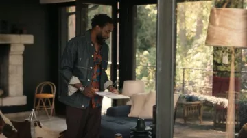 Etudes Guest Denim Chore Jacket worn by Herman's Fan (Salif Cissé) as seen in Irma Vep (S01E06)