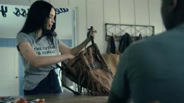 Free People Leather fringe hobo bag of Cassie (Sofia Carson) in Purple Hearts movie