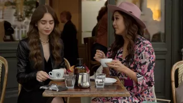Iro Bloomy Print­ed Crepe De Chine Mi­ni Wrap Dress worn by Mindy Chen (Ashley Park) as seen in Emily in Paris (S01E06)