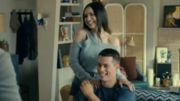 Grey asymetric ribbed top worn by Cassie (Sofia Carson) as seen in Purple Hearts