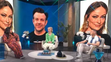 Pretty Little Thing Orange Print Beach Flares worn by Loni Love as seen in E! News Daily Pop on August 11,2022