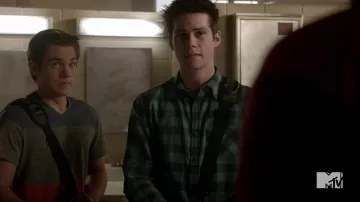 The green plaid shirt (1 pocket) by Stiles Stilinski (Dylan O'Brien) in Teen Wolf (S04E11)