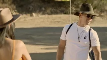 Off White white t-shirt worn by Huck Dembo (Mark Wahlberg) as seen in Me Time wardrobe