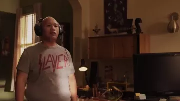 Slayer t-shirt in grey worn by Reginald Baskin (Jacob Batalon) as seen in Reginald the Vampire (Season 1)