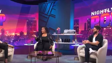 Nina Parker Trench Coat en faux cuir porté par Nina Parker comme vu dans E! News Nightly Pop le 19 septembre 2022