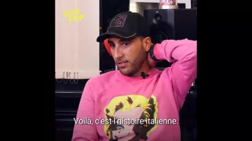 Suéter Maryline Monroe usado por Heuss lenfoirer la moula en el video Heuss l'Enfoiré: "¿Mi hazaña soñada? Jean-Jacques Goldman" | Saltar saltar
