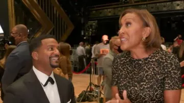 Michael Kors Lace Flared-Leg Jumpsuit worn by Robin Roberts as seen in Good Morning America on October 4, 2022