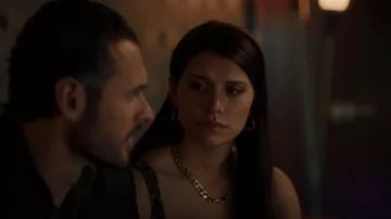 Bottega Veneta Gold Plated Twisted Hoop Earrings worn by Nadia Morales (Eva De Dominici) as seen in The Cleaning Lady (S02E03)