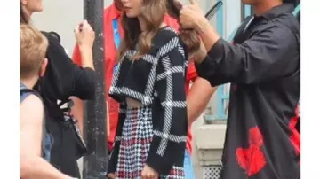 Stella McCartney windowpane check print sweatshirt worn by Lily Collins while filming Emily in Paris TV series Season 3