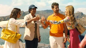 Bottega Veneta Yellow handbag worn by Harper Spiller (Aubrey Plaza) as seen in The White Lotus TV show (Season 2)