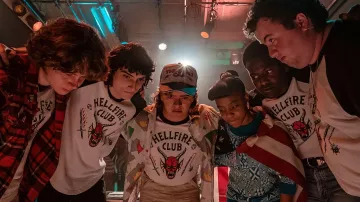 "Hellfire Club" Long-sleeve Raglan Tee worn by Mike Wheeler (Finn Wolfhard) in Stranger Things TV show outfits (Season 4 Episode 1)