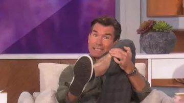 Comme des Garçons Play Chuck Tay­lor All Star Low-Top Sneakers worn by Jerry O'Connell as seen in The Talk on October 14, 2022