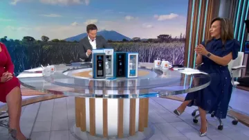 Zalinah White High Neck Midaxi avec détail d’arc et manches froncées portées par Michelle Miller comme vu dans CBS Mornings le 16 octobre 2022