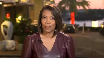 Ann Taylor Faux Leather Puff Sleeve Peplum Top porté par Nikole Killion comme vu dans CBS Mornings le 16 octobre 2022