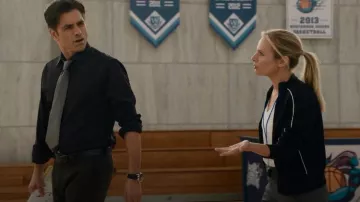 Adidas Black Track Jack­et worn by Holly Barrett (Jessalyn Gilsig) as seen in Big Shot (S01E05)