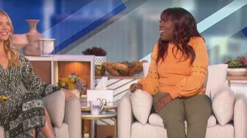 Sioni Orange Embroidered Top worn by Sheryl Underwood as seen in The Talk on October 24, 2022