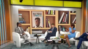 Thom Brown Clas­sic Rise Back­strap Pleat­ed Skirt worn by Billy Porter as seen in CBS Mornings on October 24, 2022