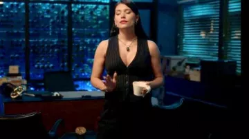 Saint Laurent High Waist Wide Leg Trousers worn by Nadia Morales (Eva De Dominici) as seen in The Cleaning Lady (S02E06)