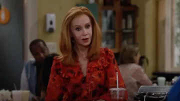 Alice + Olivia Floral Print Ruffle Cotton & Silk Blouse worn by Sheila (Swoosie Kurtz) as seen in Call Me Kat (S03E06)