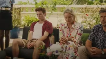 Zara Flo­ral Belt­ed Dress worn by Holly Faircroft (Tamzin Outhwaite) as seen in Death in Paradise (S11E02)